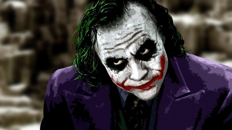 Joker với gương mặt của một thằng hề và nụ cười nhạo báng.