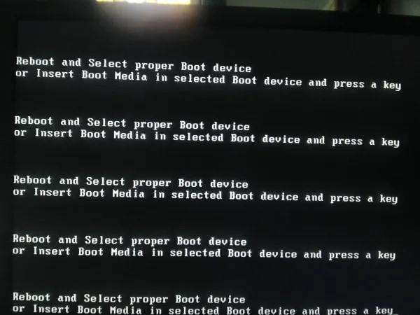 Lỗi máy tính reboot and select proper boot device